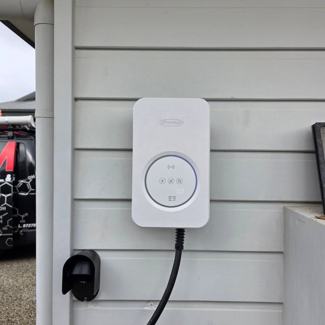 Fronius EV charger outdoor installation on weatherboard home