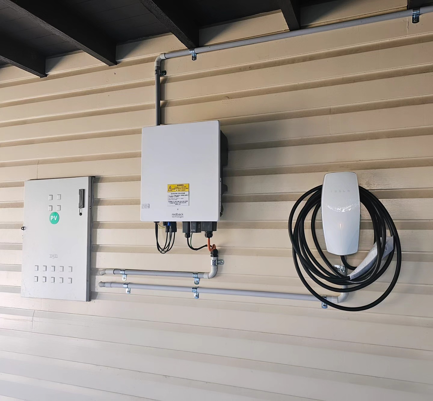 Tesla Wall Connector installed with Redback solar inverter — Brisbane