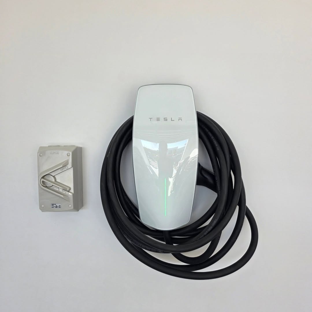 Tesla Wall Connector with isolator switch — clean wall install