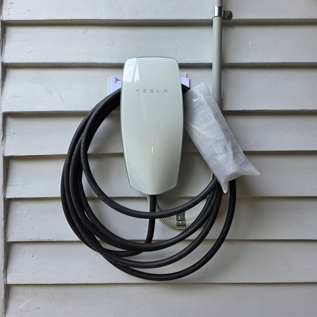 Tesla Wall Connector outdoor installation on weatherboard — Brisbane